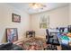 Bright office space with a window, desk, chair, and decorative artwork at 2354 Buffalo Run Ave, Las Vegas, NV 89123