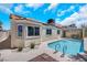 Backyard view with pool and covered patio at 2860 Misty Ct, Henderson, NV 89074