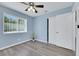 Bright bedroom featuring closet and window with natural light, plus ceiling fan at 2860 Misty Ct, Henderson, NV 89074