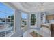 Bright dining area with large windows offering pleasant outdoor views and lots of light at 2860 Misty Ct, Henderson, NV 89074