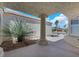 Covered porch with decorative column and desert landscaping at 2860 Misty Ct, Henderson, NV 89074