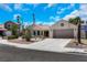 Charming single-story home with desert landscaping, tile roof, and a two-car garage at 2860 Misty Ct, Henderson, NV 89074
