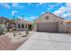 Charming single-story home with desert landscaping, tile roof, and a two-car garage at 2860 Misty Ct, Henderson, NV 89074