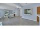 Bright living room with vaulted ceiling and sliding glass doors to the backyard at 2860 Misty Ct, Henderson, NV 89074