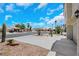 Quiet neighborhood street with single-story homes and desert landscaping at 2860 Misty Ct, Henderson, NV 89074