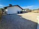 The home's backyard features a simple yard and exterior at 3215 Dillon Ave, North Las Vegas, NV 89030