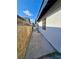 A view of the side of the home at 3215 Dillon Ave, North Las Vegas, NV 89030