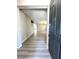Spacious entryway with wood-look flooring and open floor plan leading to the living area at 3221 Villa Pisani Ct, North Las Vegas, NV 89031