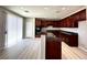 Modern kitchen with stainless steel sink, granite countertops, and custom cabinets, perfect for culinary enthusiasts at 3221 Villa Pisani Ct, North Las Vegas, NV 89031