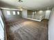 Expansive loft space with neutral paint, ceiling fan, and lots of room for various activities at 3221 Villa Pisani Ct, North Las Vegas, NV 89031