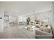 Bright, open-concept living room featuring modern decor and neutral tones at 3270 Trabia Ave, Henderson, NV 89044
