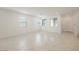 Spacious living area with tile flooring, large windows, and ample natural light at 3270 Trabia Ave, Henderson, NV 89044