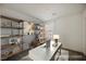 Bright office space features practical shelving and a clean, modern desk at 3270 Trabia Ave, Henderson, NV 89044