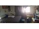 Bedroom featuring a full bed, dresser, and a window with natural light at 3363 Pavlo St, Las Vegas, NV 89121
