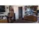 Bedroom featuring a mounted TV, chair and dresser with a mirror at 3363 Pavlo St, Las Vegas, NV 89121