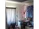 Bedroom with eclectic decor and a cozy, personal touch at 3363 Pavlo St, Las Vegas, NV 89121