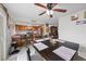 Dining area with wood table set, decorative accents, and view into kitchen at 3363 Pavlo St, Las Vegas, NV 89121