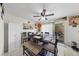 Dining area with wood table set, tile flooring, view of backyard at 3363 Pavlo St, Las Vegas, NV 89121