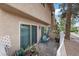 Cozy patio featuring a swing, brick flooring, and view of neighboring property at 3363 Pavlo St, Las Vegas, NV 89121