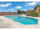 A community pool surrounded by fence, providing a refreshing escape at 3363 Pavlo St, Las Vegas, NV 89121
