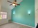 Bedroom features high ceilings, wood-look tile flooring, and a modern ceiling fan at 3606 Di Salvo Dr # 133, Las Vegas, NV 89103
