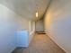 Bonus room featuring carpet, a small window, and custom built-in shelving and lighting at 3606 Di Salvo Dr # 133, Las Vegas, NV 89103