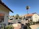 Lovely community view featuring a large parking lot, red tiled roofs and nice landscaping at 3606 Di Salvo Dr # 133, Las Vegas, NV 89103