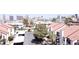 Charming townhouse complex with red tile roofs offers a community feel and views of the Las Vegas skyline at 3606 Di Salvo Dr # 133, Las Vegas, NV 89103