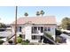 A charming two-story condo with a stucco exterior, black trim and a red tiled roof in a well-maintained complex at 3606 Di Salvo Dr # 133, Las Vegas, NV 89103