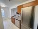Well-lit kitchen showcasing stainless steel appliances and granite countertops at 3606 Di Salvo Dr # 133, Las Vegas, NV 89103
