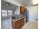 Open-concept kitchen with stainless steel appliances and a peninsula at 3606 Di Salvo Dr # 133, Las Vegas, NV 89103