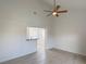 Open concept living room with a ceiling fan and kitchen view at 3606 Di Salvo Dr # 133, Las Vegas, NV 89103