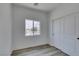 Comfortable bedroom features natural light and a sliding door closet for storage at 365 N 16Th St, Las Vegas, NV 89101