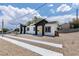 Charming home featuring a well-maintained exterior, xeriscaping and a paved driveway at 365 N 16Th St, Las Vegas, NV 89101