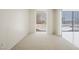 A bright, airy bedroom with modern minimalist design, large windows and neutral tones, creating a serene and inviting space at 3726 Las Vegas Blvd # 704, Las Vegas, NV 89158
