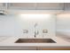 A close-up showcasing a modern kitchen sink with sleek fixtures and minimalist design, blending style and functionality at 3726 Las Vegas Blvd # 704, Las Vegas, NV 89158