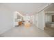Open living space with white tile floors, a kitchen, and a bathroom at 3726 Las Vegas Blvd # 704, Las Vegas, NV 89158