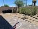 Backyard featuring gravel, block wall and an outdoor play area at 4056 Campeche Ave, Las Vegas, NV 89121