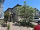 Charming exterior elevation with mature landscaping, and a well maintained yard at 4056 Campeche Ave, Las Vegas, NV 89121