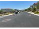 Neighborhood street view showcasing the well-maintained surroundings and community appeal at 4056 Campeche Ave, Las Vegas, NV 89121