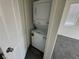 Convenient stacked washer and dryer in the laundry area at 4076 Topaz Hills Dr, North Las Vegas, NV 89032