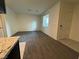 Spacious living room with plush carpet and neutral paint at 4076 Topaz Hills Dr, North Las Vegas, NV 89032