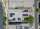 Aerial view of rooftops with solar panels and green backyards at 412 Gracious Way, Henderson, NV 89011