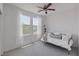 Minimalist bedroom boasts plentiful natural light, comfortable daybed, and tasteful decor at 412 Gracious Way, Henderson, NV 89011