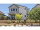 Charming two-story home boasts inviting curb appeal and well-maintained landscaping at 412 Gracious Way, Henderson, NV 89011
