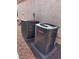 Image features two Goodman-branded air conditioning units on a gravel surface, ensuring efficient home cooling at 4126 Jessica Marie St, North Las Vegas, NV 89032