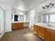 Well-lit bathroom featuring dual sinks, generous counter space, and a separate shower area at 4126 Jessica Marie St, North Las Vegas, NV 89032