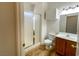 Bathroom with glass shower, wood-look flooring, vanity and single sink at 4126 Jessica Marie St, North Las Vegas, NV 89032