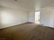 Spacious bedroom featuring neutral carpeting, white walls, and an ensuite bathroom access at 4126 Jessica Marie St, North Las Vegas, NV 89032