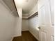 Walk-in closet with ample shelving and hanging space for organized storage at 4126 Jessica Marie St, North Las Vegas, NV 89032